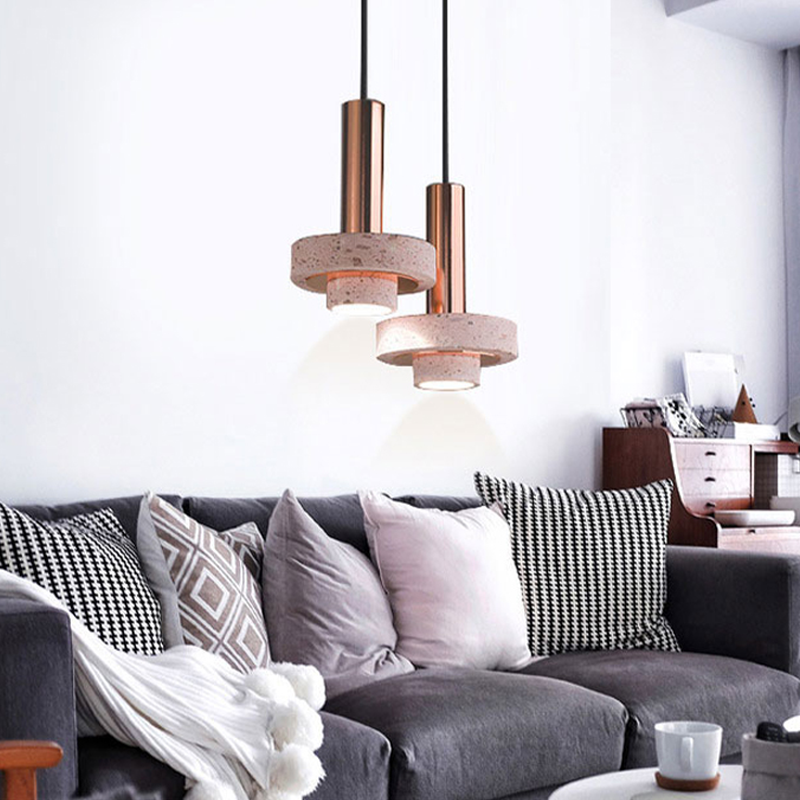 Kitchen pendant light turned on over a modern living room