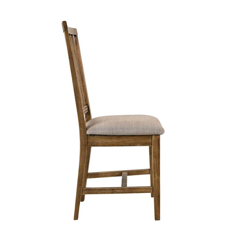 Side view of wooden dining room chair 