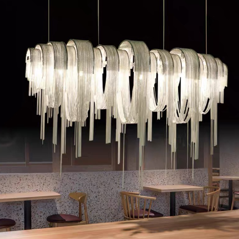 Modern dining chandelier lighting a dining space