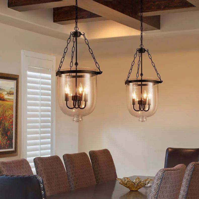 kitchen pendant lights hunged over a dining table