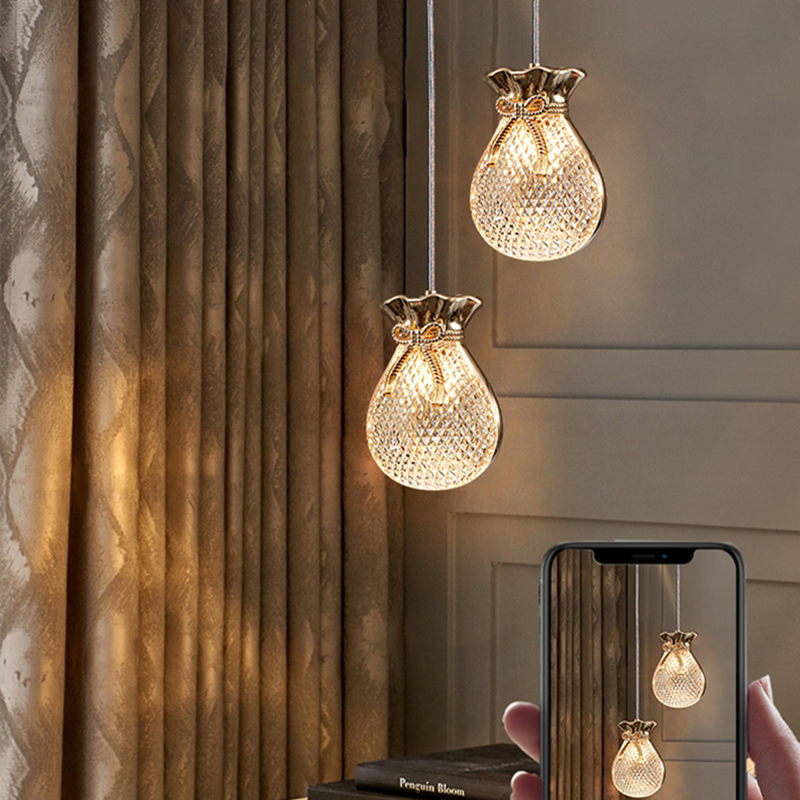 Kitchen pendant light glowing in a dim lighted room 