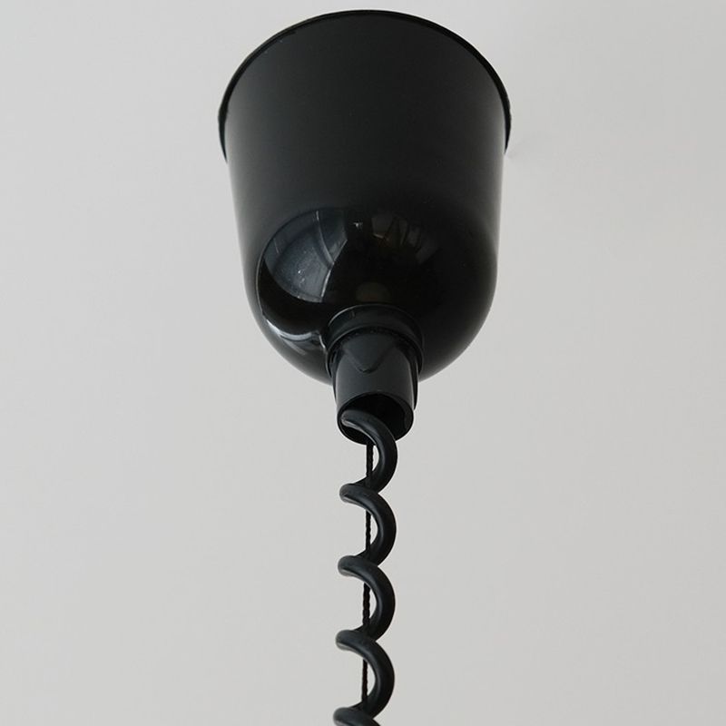 Sectioned image of kitchen island pendant light fitting and spiral cord