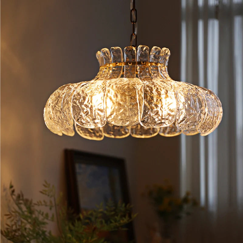 Island pendant light glowing in a dim lighted room