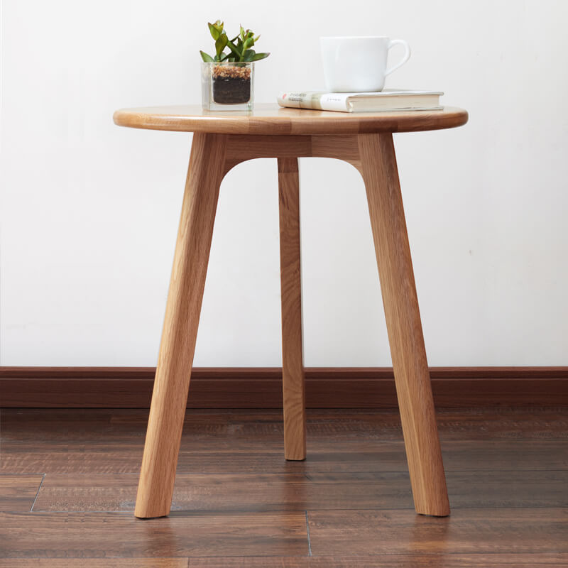 a close up view of a wooden end table