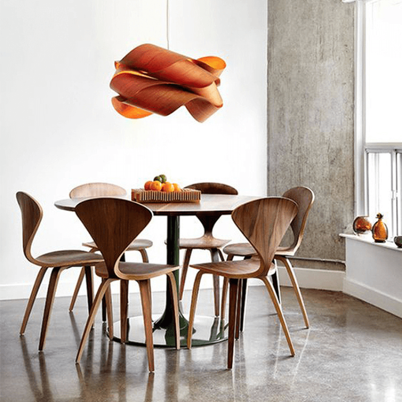 Wooden dining room chair in modern dining room setting