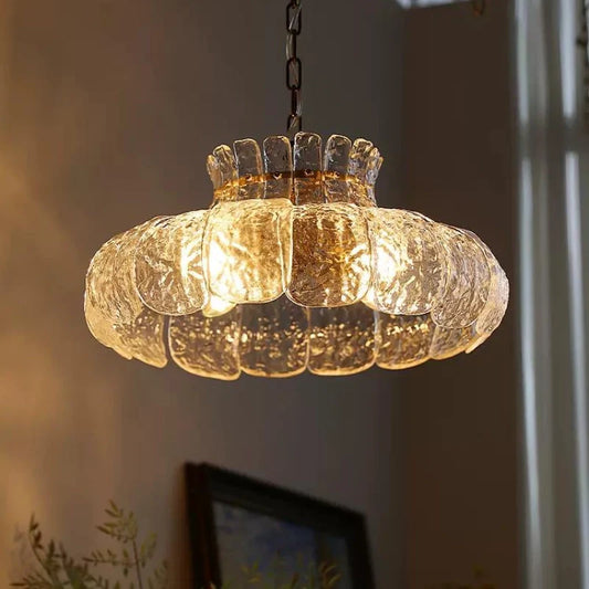 Island pendant light glowing in a dim lighted room