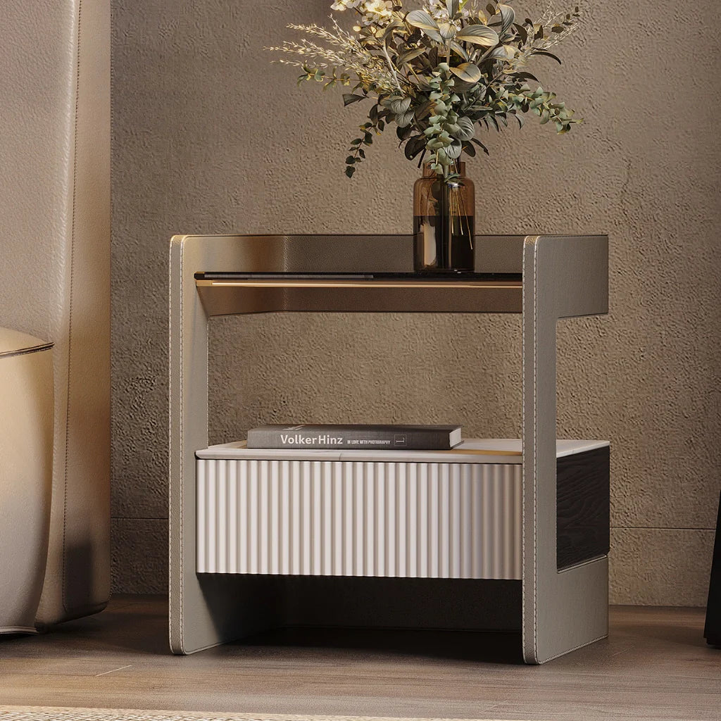 A modern minimalist nightstand image featuring its glass and stone accents, adding a stylish touch to a living area