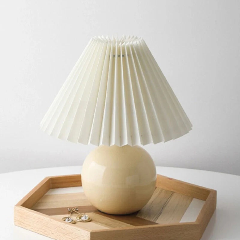 Two-tone ceramic table lamp with pleated lamp shade and round base