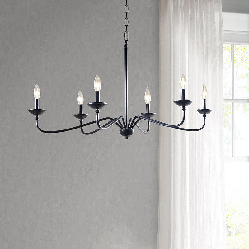 Black dining chandelier turned on