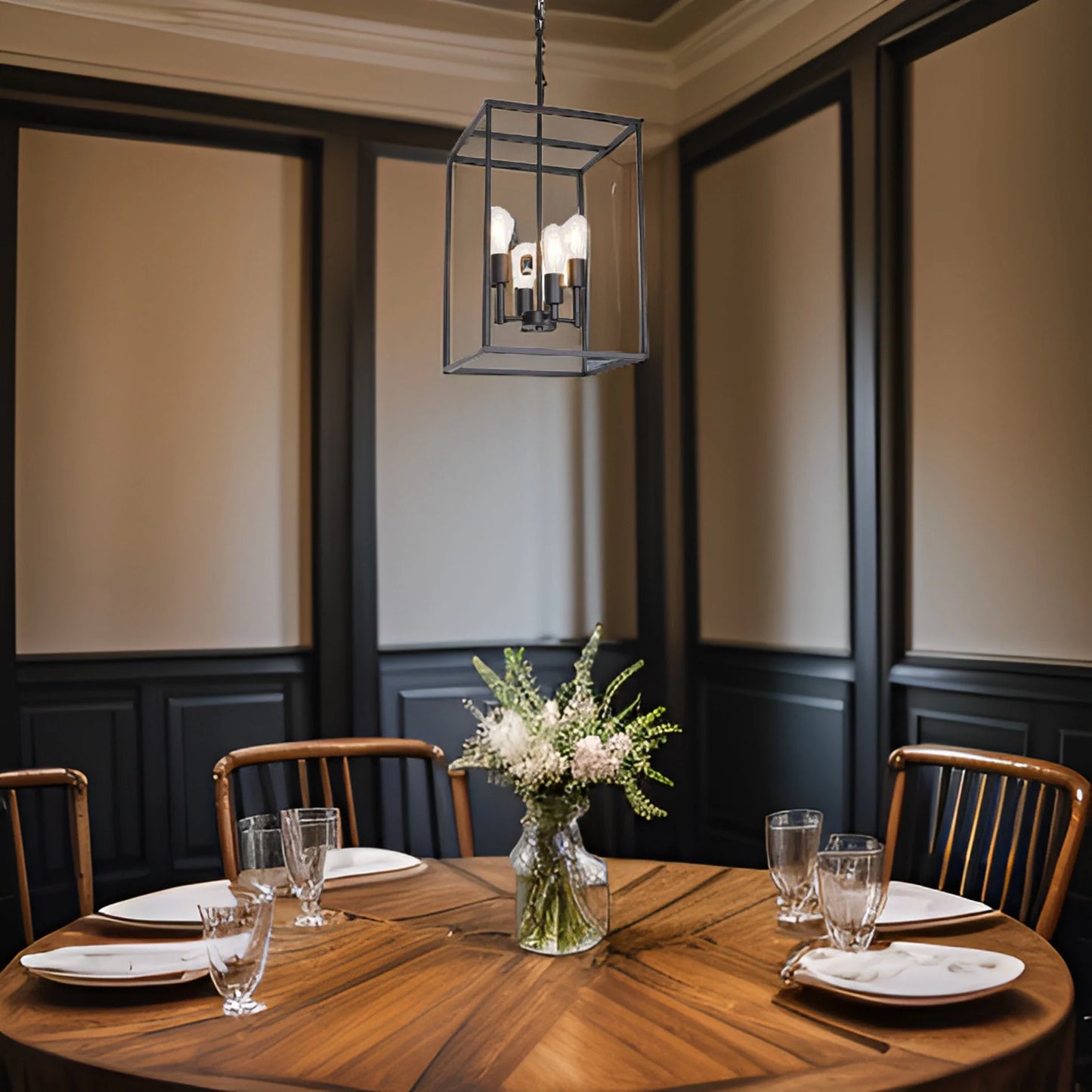 A black metal dining room chandelier above a chic dining table