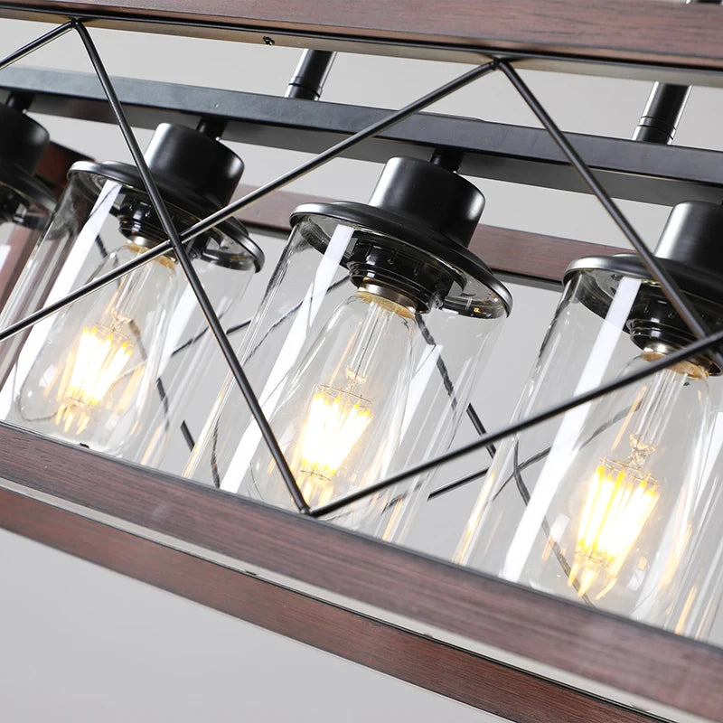 A rustic kitchen island chandelier showcasing its glass lampshade