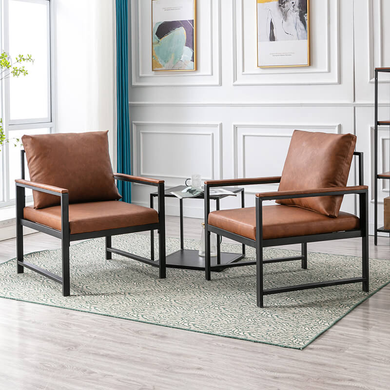 two modern leather accent chairs in a modern living room