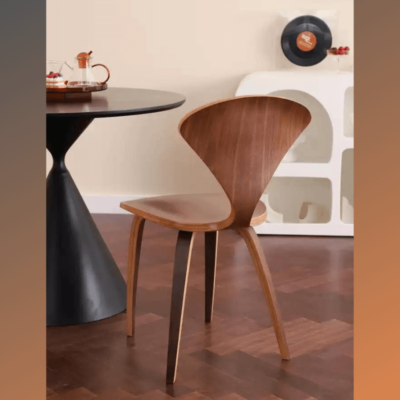 Back view of wooden dining room chair in a modern dining area