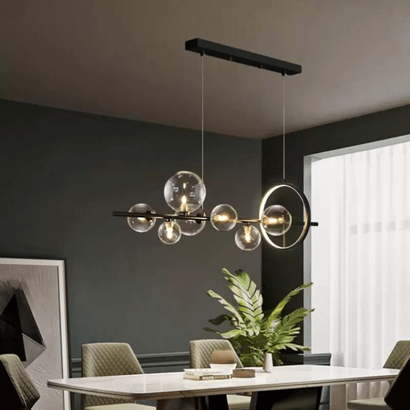 a kitchen island chandelier in a modern dining room