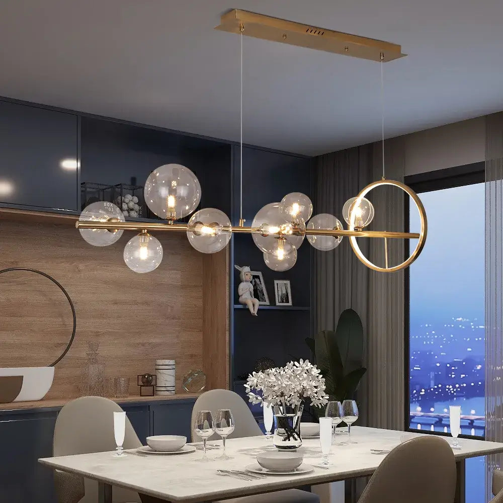 A Modern Linear Kitchen Island Chandelier with Glass Globe Shade