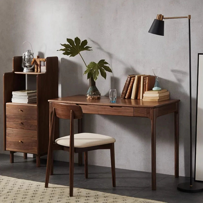 a wooden desk with drawers paired with a matching chair