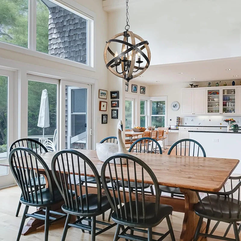 a 4-light farmhouse dining chandelier hanged above a large dining table