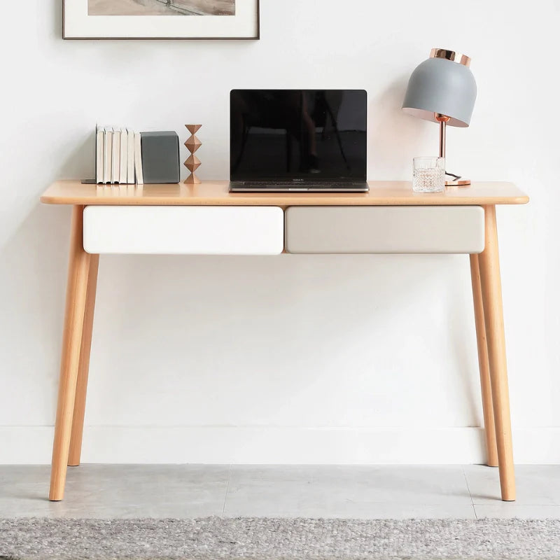 a solid wood desk with drawers and tapered legs