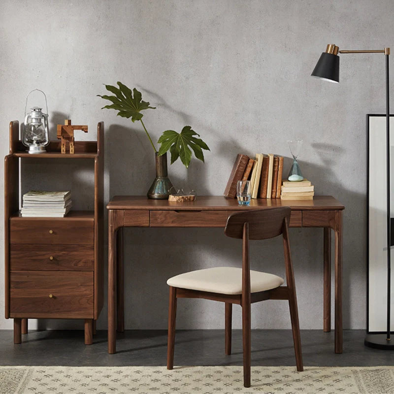 a retro wooden desk with drawers adorned with some books and plants