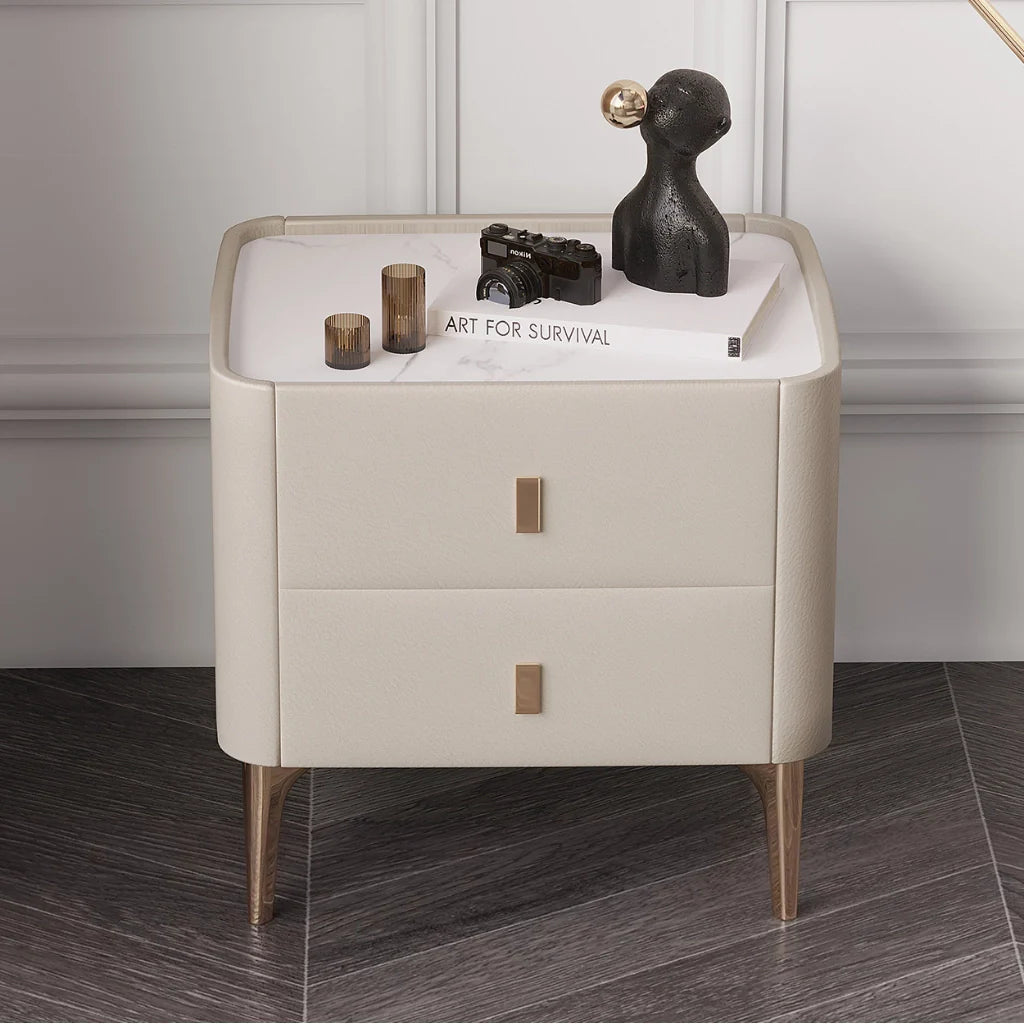 A cute modern nightstand image styled with a large figurine and other decorative items for a chic nightstand aesthetic.