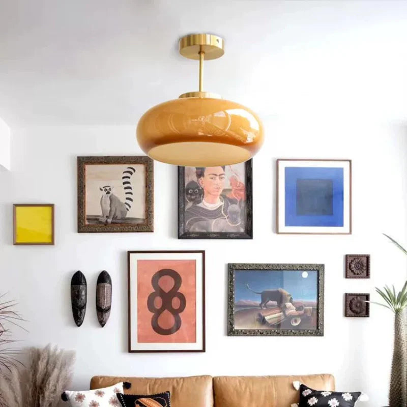 a glass pendant light in a contemporary living area