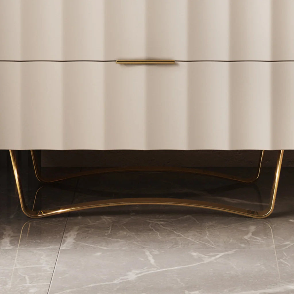 Close up view of the Modern Nightstand, showcasing its gold drawer handle and stainless steel base