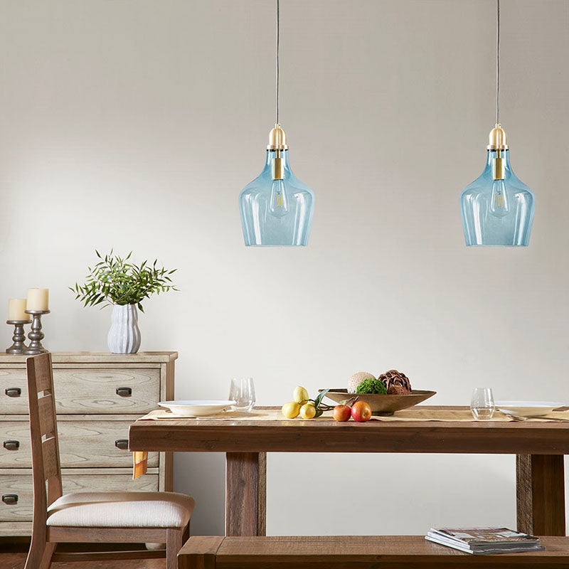 kitchen pendant lights hung over a dining table