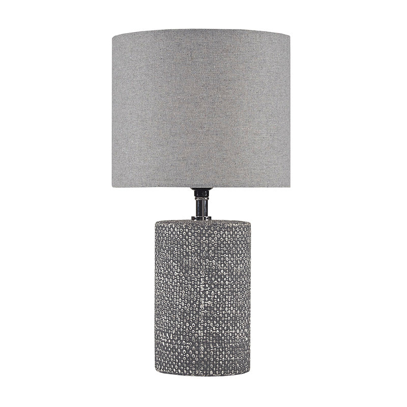 Full view of Ceramic table lamp with embossed base turned off