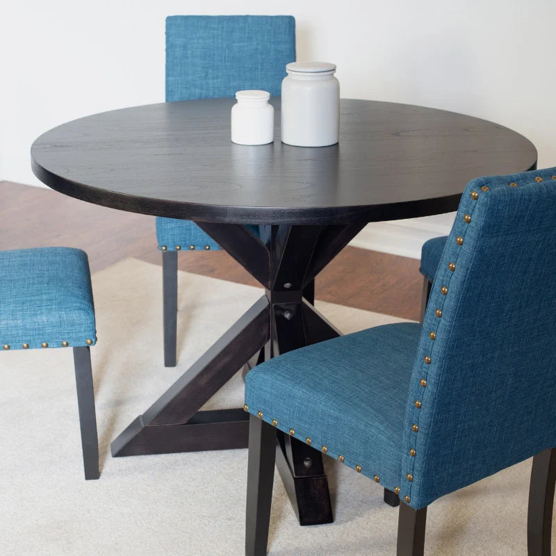 Black Wooden Dining Table with Upholstered Nailhead Designed Chairs