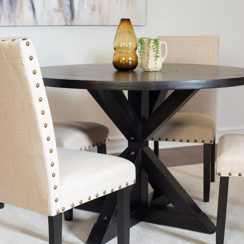 Round Wood Dining Table for 4 with Upholstered Nailhead Designed Chairs.