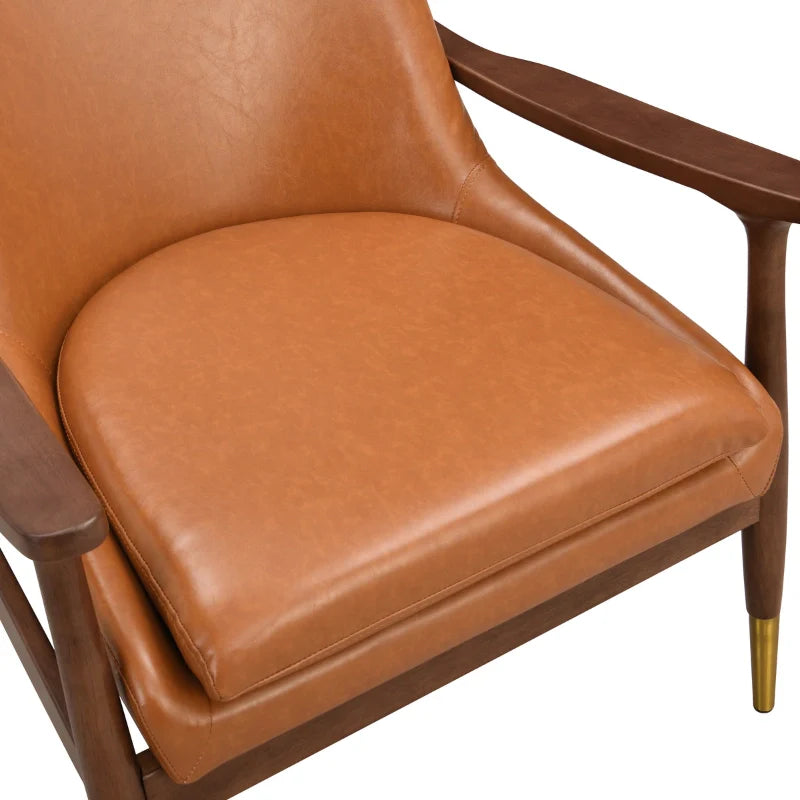 Up close of brown leather accent chair highlighting its plush cushioning