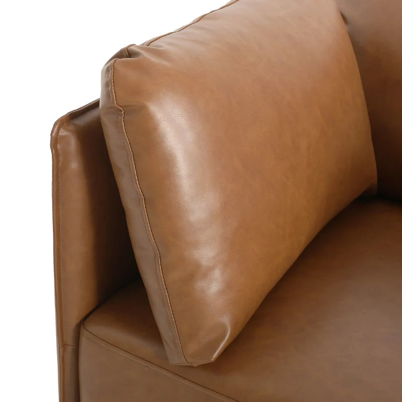 Plush armrest of brown leather lounge chair