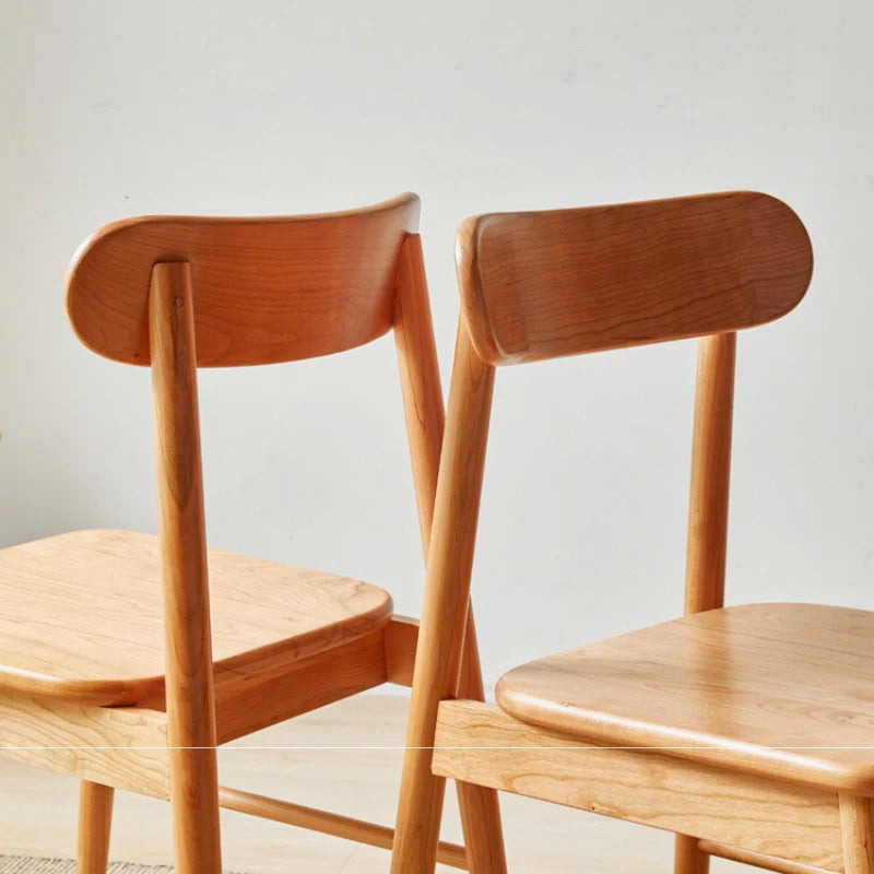 A Wood Dining Chair Featuring a Curved Backrest