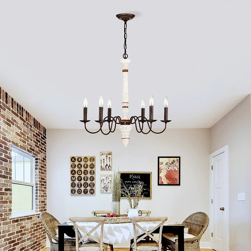 6 Light dining room chandelier mounted above a cozy dining room setting