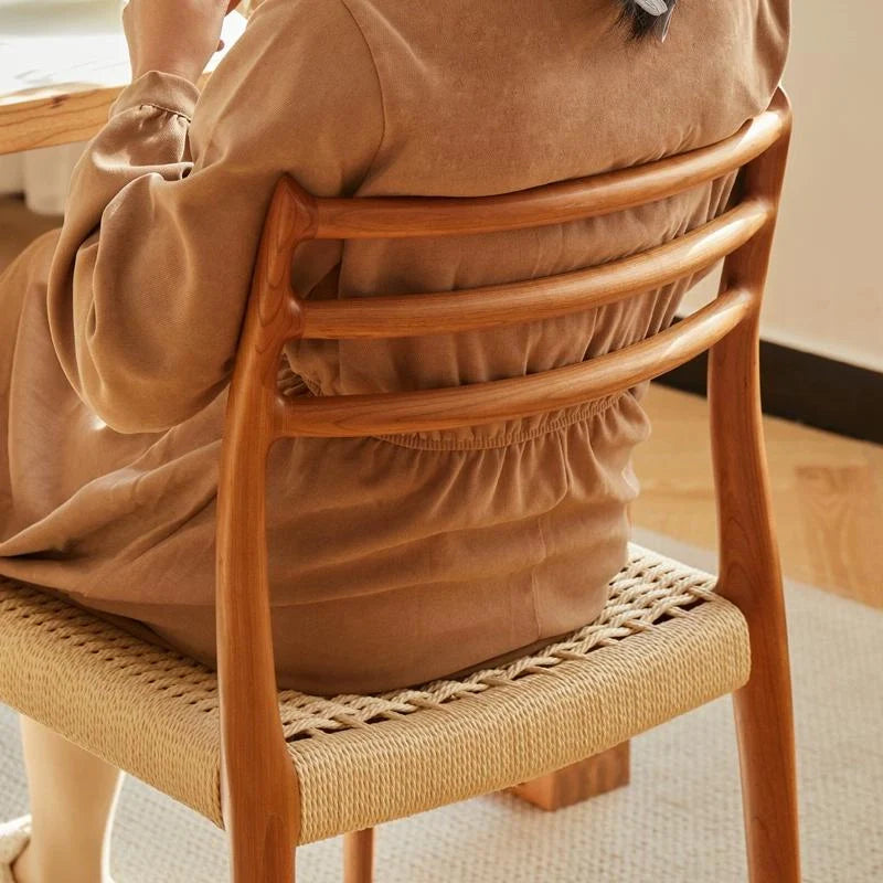 A Wood Dining Chair featuring a Curved Backrest