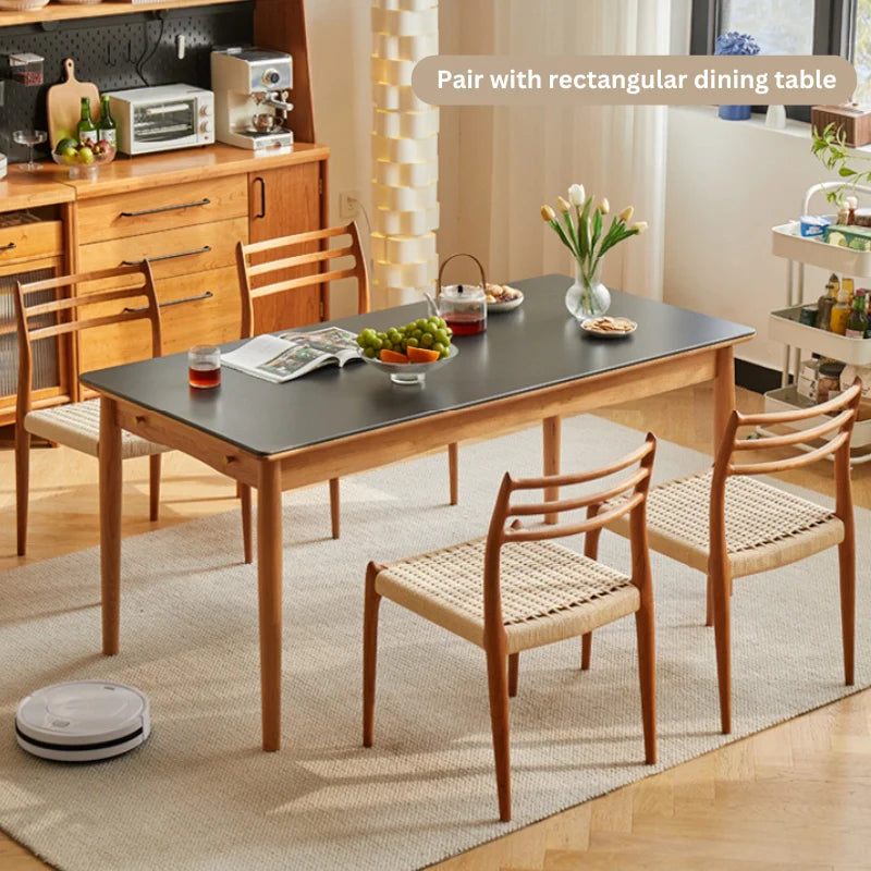 Wooden Dining Chairs Placed Around A Wood Dining Table