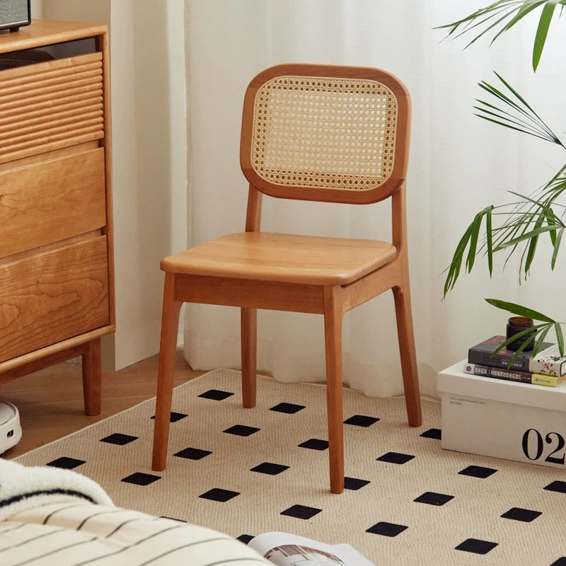 Japandi Rattan and Wood Dining Chair in a Cozy Room Setting