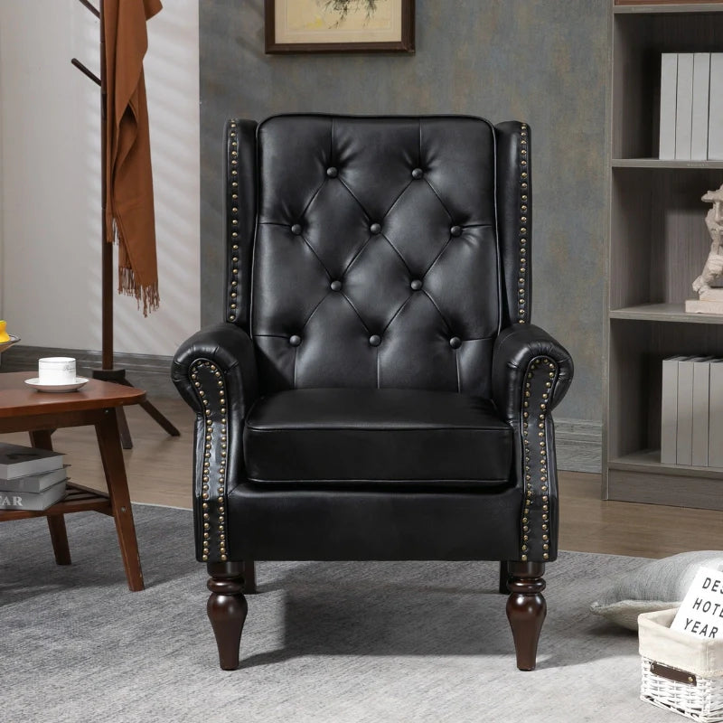 Black leather accent chair with tuft design in a comfy home office setting