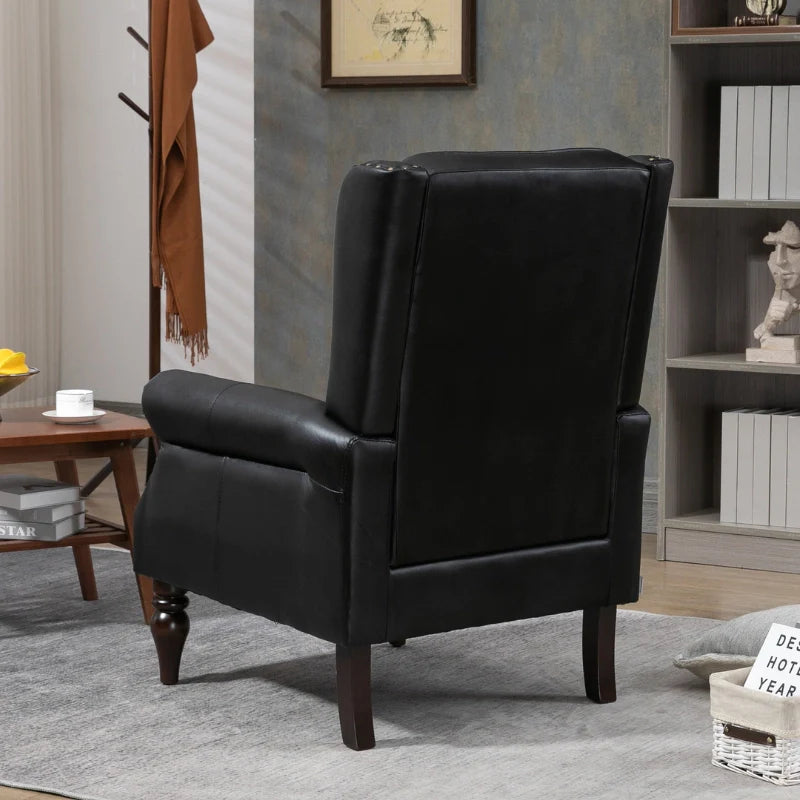 Back view of black leather accent chair with high back and sturdy legs in a comfy home office setting