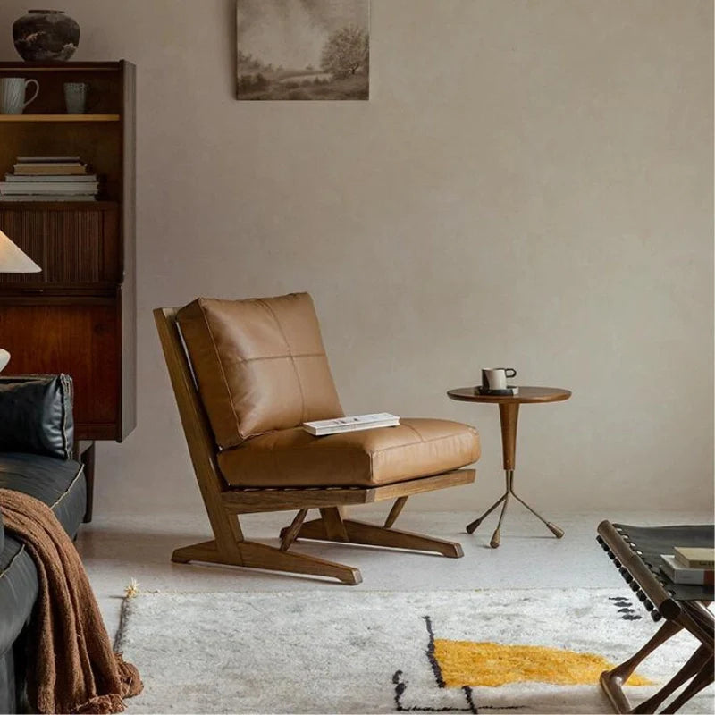 modern upholstered leather accent chair in a furnished living room