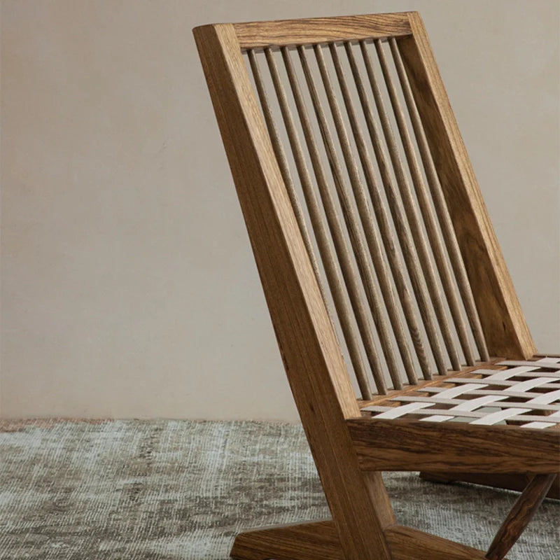 the backrest of a modern leather accent chair