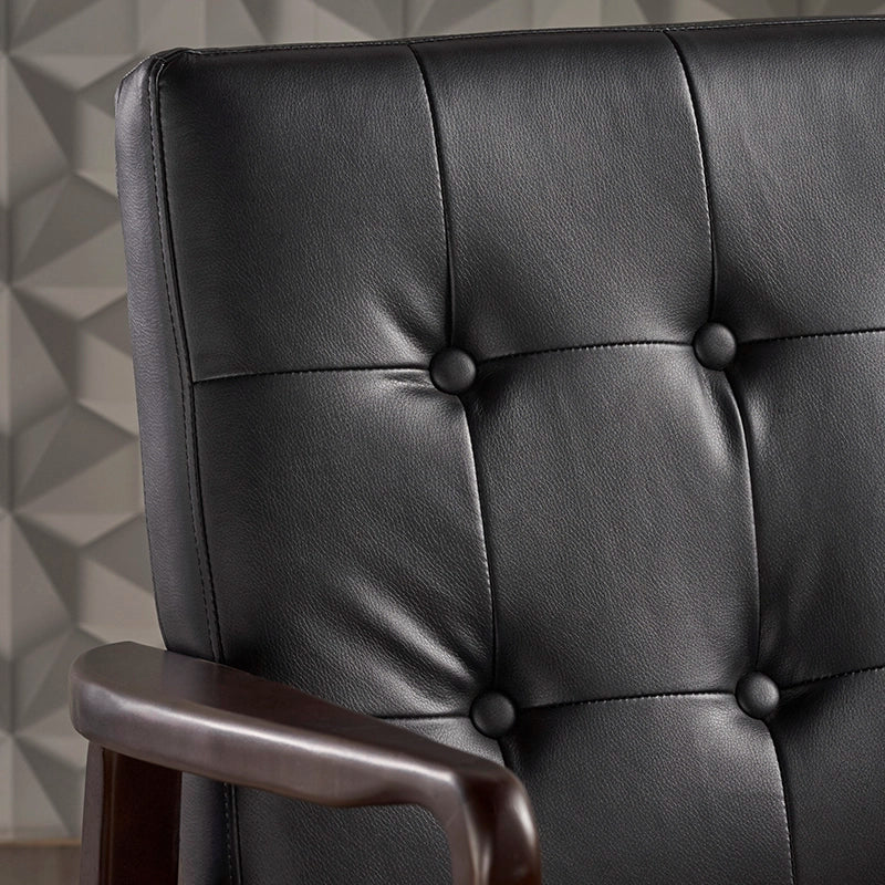 the backrest of a leather accent chair