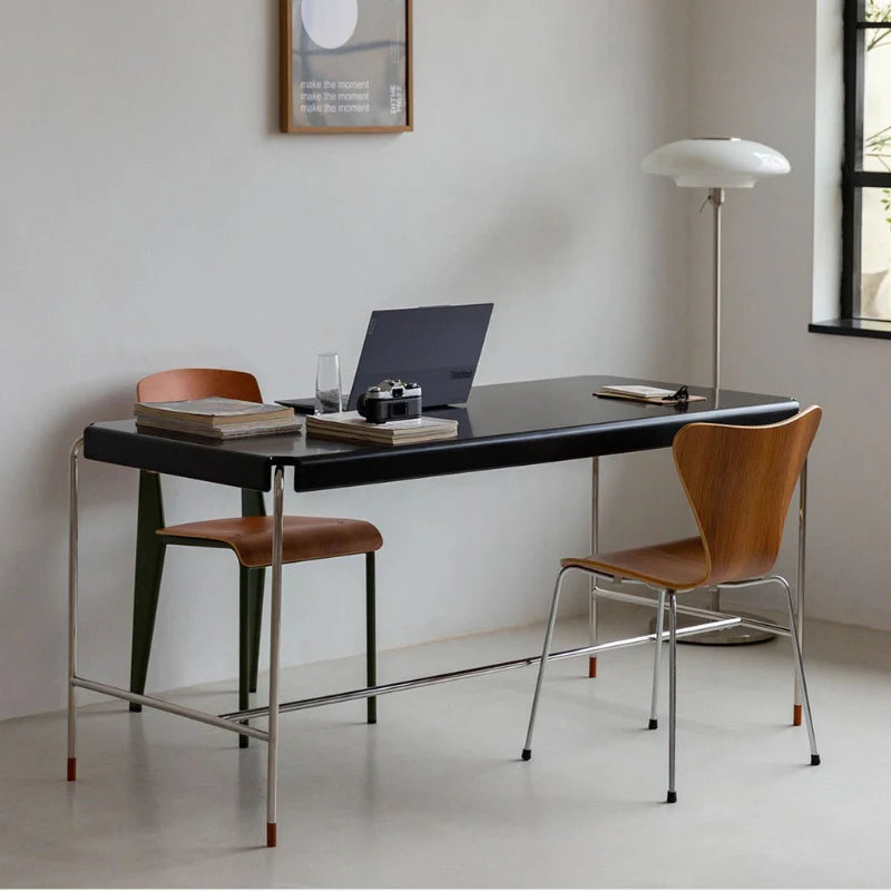 a wood and metal desk looking chic and stylish in a living area