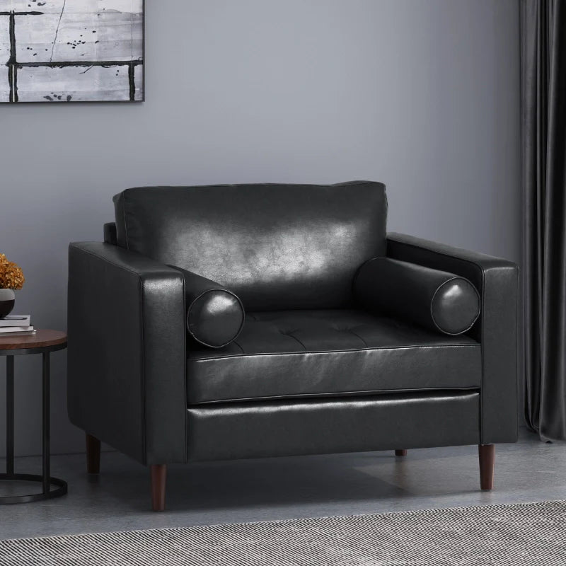 A black leather accent chair in a modern setting