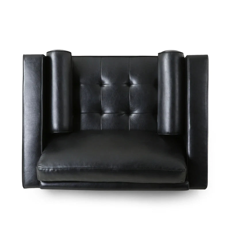 A close-up view of a black leather accent chair 