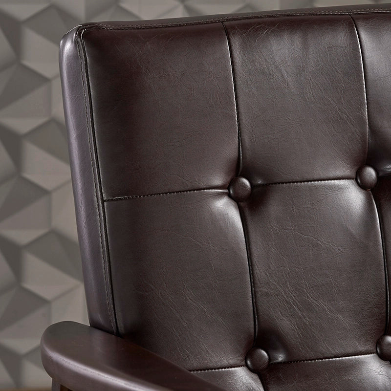 the backrest of a leather accent chair