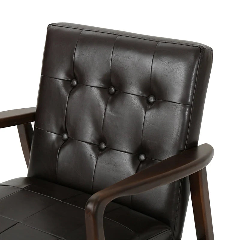 the backrest of a leather accent chair