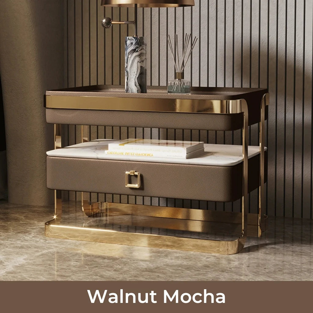 An image of modern nightstand with a sleek tempered glass top, PU leather drawer, gold metal frame, and open sintered stone shelf, showcasing a stylish and functional design perfect for bedside table ideas and contemporary bedroom aesthetics.