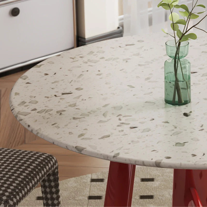 a wood dining table with sintered stone top