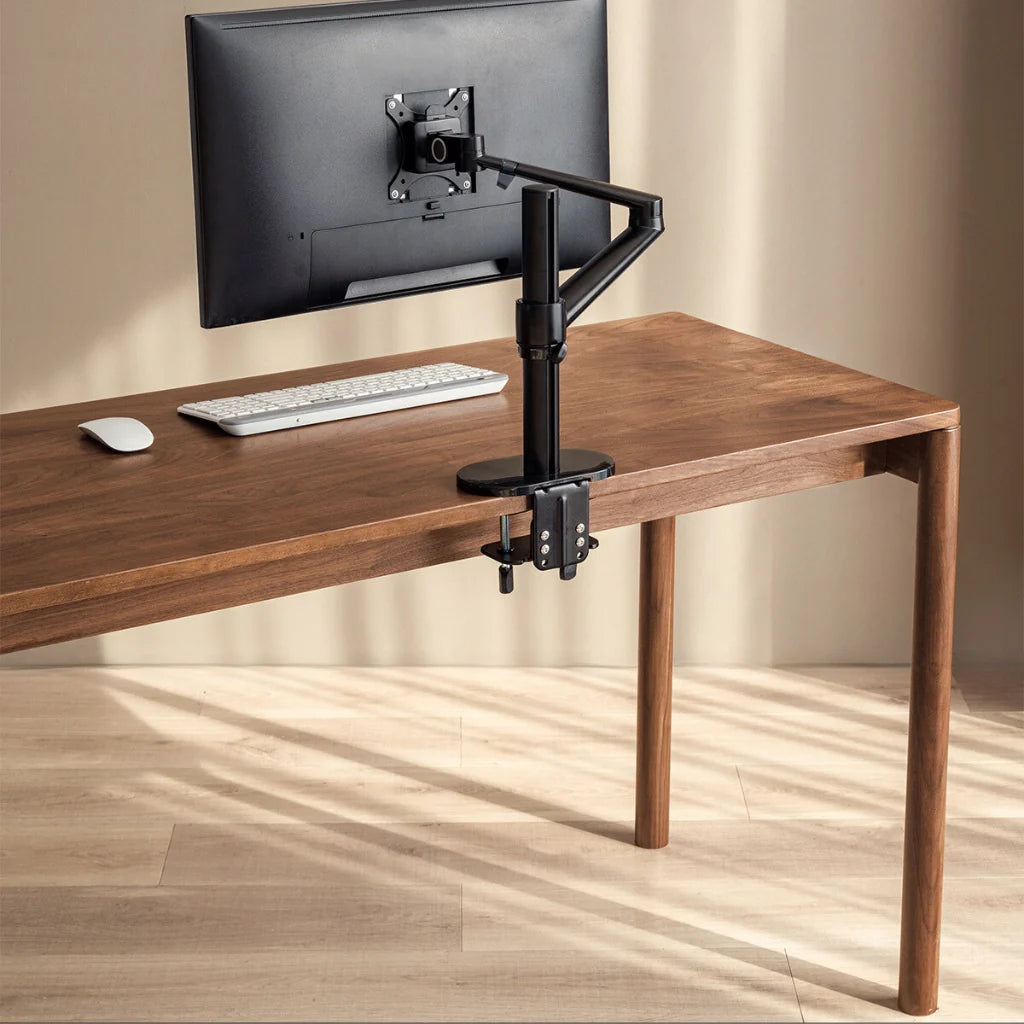 A stylish wood office desk with a practical drawer layout for easy access to items.